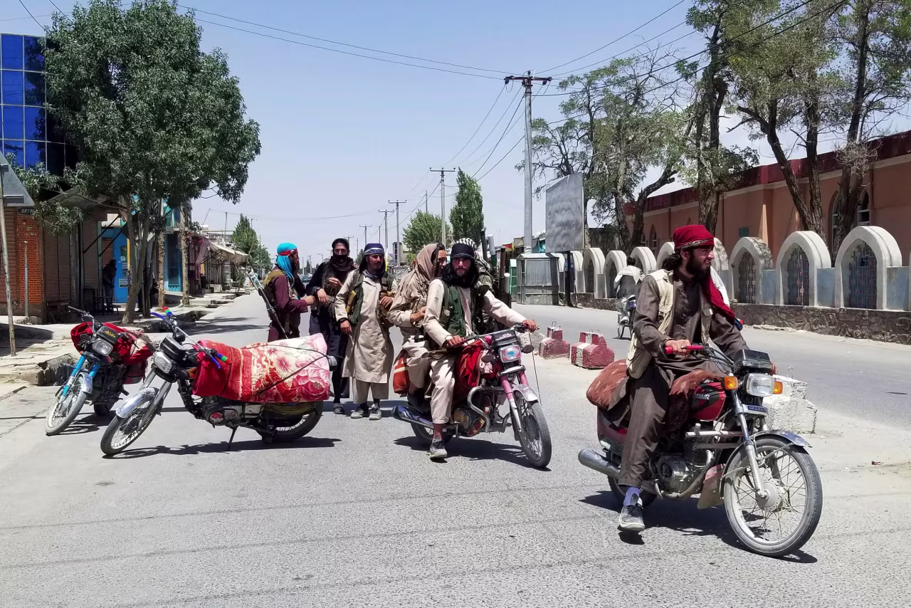 Taliban fighters patrol inside Ghazni, Afghanistan, on August 12. 