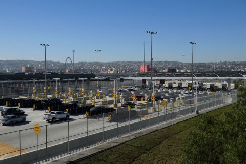 Vehicles enter a border checkpoint at the US Customs and Border Protection San Ysidro Port of Entry at the US Mexico border on February 19 in San Diego, California. 