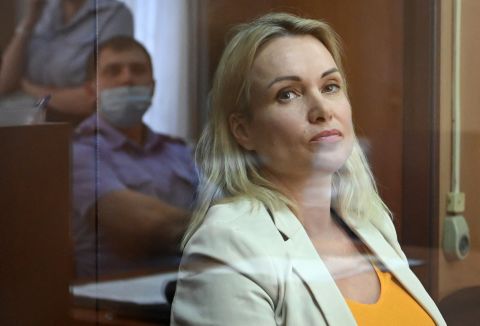Former Russian state TV editor Marina Ovsyannikova, stands inside a defendants' box during a court session over charges of "discrediting" the Russian army, in Moscow, on August 11.