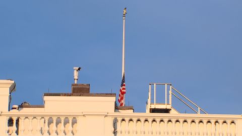 The US flag is lowered at the White House in Washington, DC, on August 26.