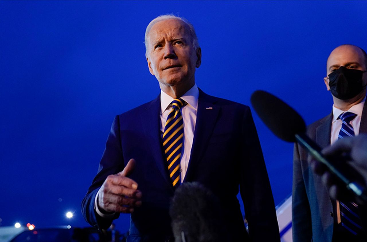 President Joe Biden speaks to members of the media before boarding Air Force One at Minneapolis-Saint Paul International Airport in Minneapolis, Tuesday, November 30, after visiting Dakota County Technical College in Rosemount, Minnesota.