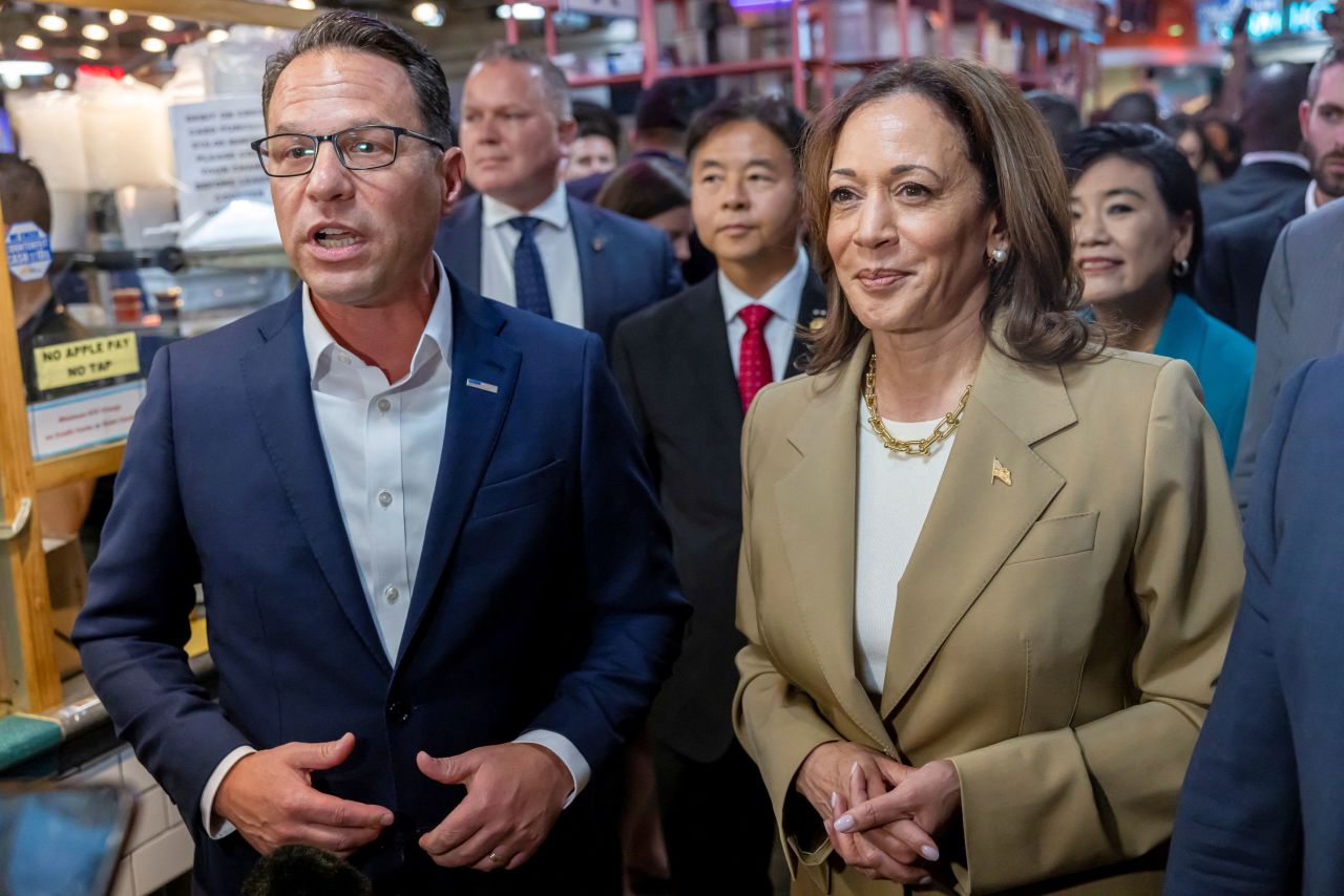 Pennsylvania Governor Josh Shapiro, left, and Vice President Kamala Harris speak to the press in Philadelphia on July 13.