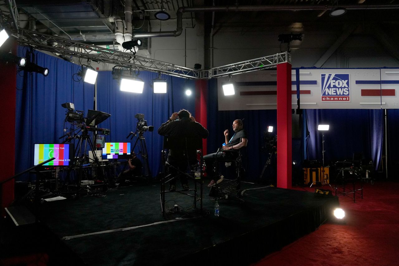 FOX News producers set up a shot in the media room at Fiserv Forum on Wednesday.