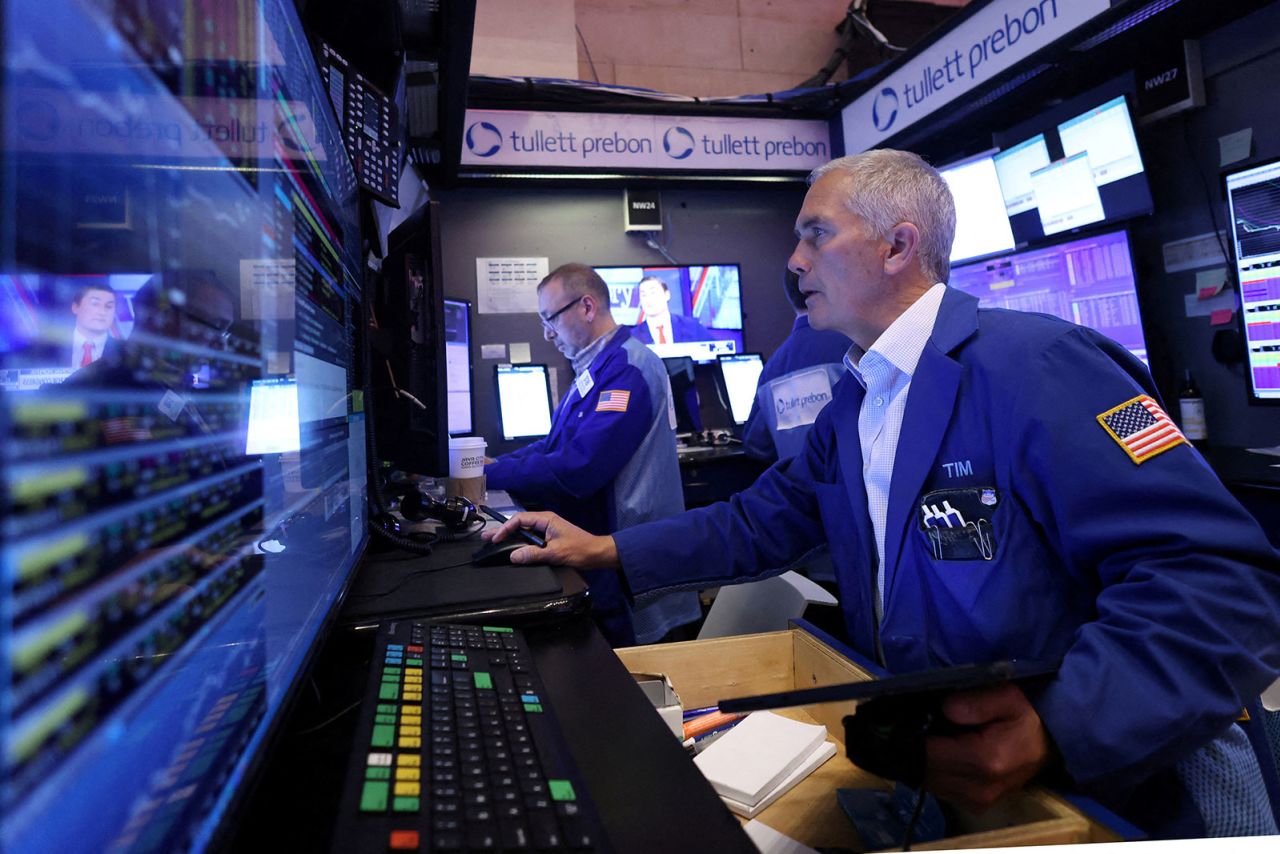 Traders work on the trading floor at the New York Stock Exchange in New York on April 4.