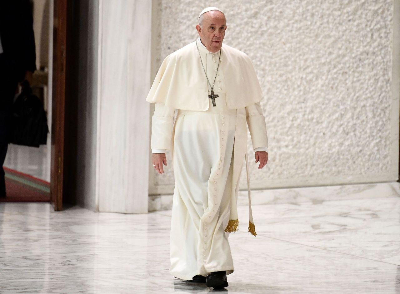 Pope Francis arrives to hold a general audience at the Vatican on October 27.