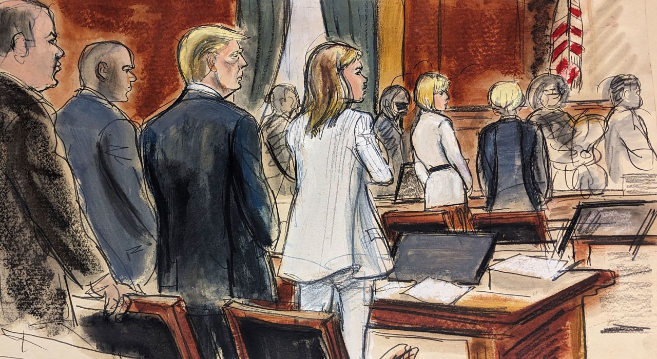 In this courtroom sketch, prospective jurors file into a New York courtroom as Donald Trump, third left, stands surrounded by his defense team on Tuesday.