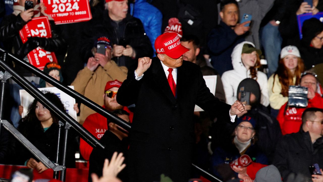 Former President Donald Trump gestures during a campaign rally in Schnecksville, Pennsylvania, on April 13.