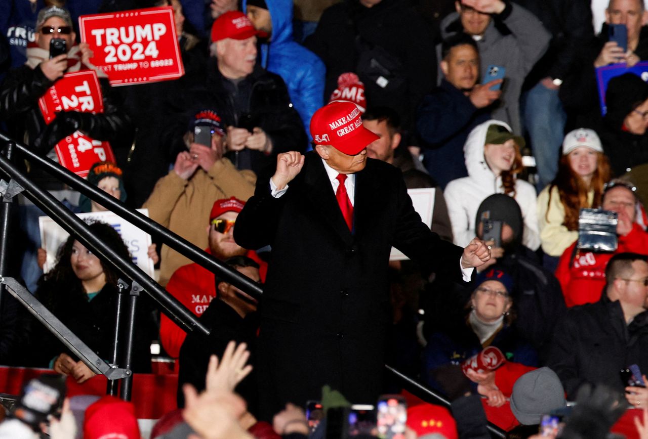 Former President Donald Trump gestures during a campaign rally in Schnecksville, Pennsylvania, on April 13.