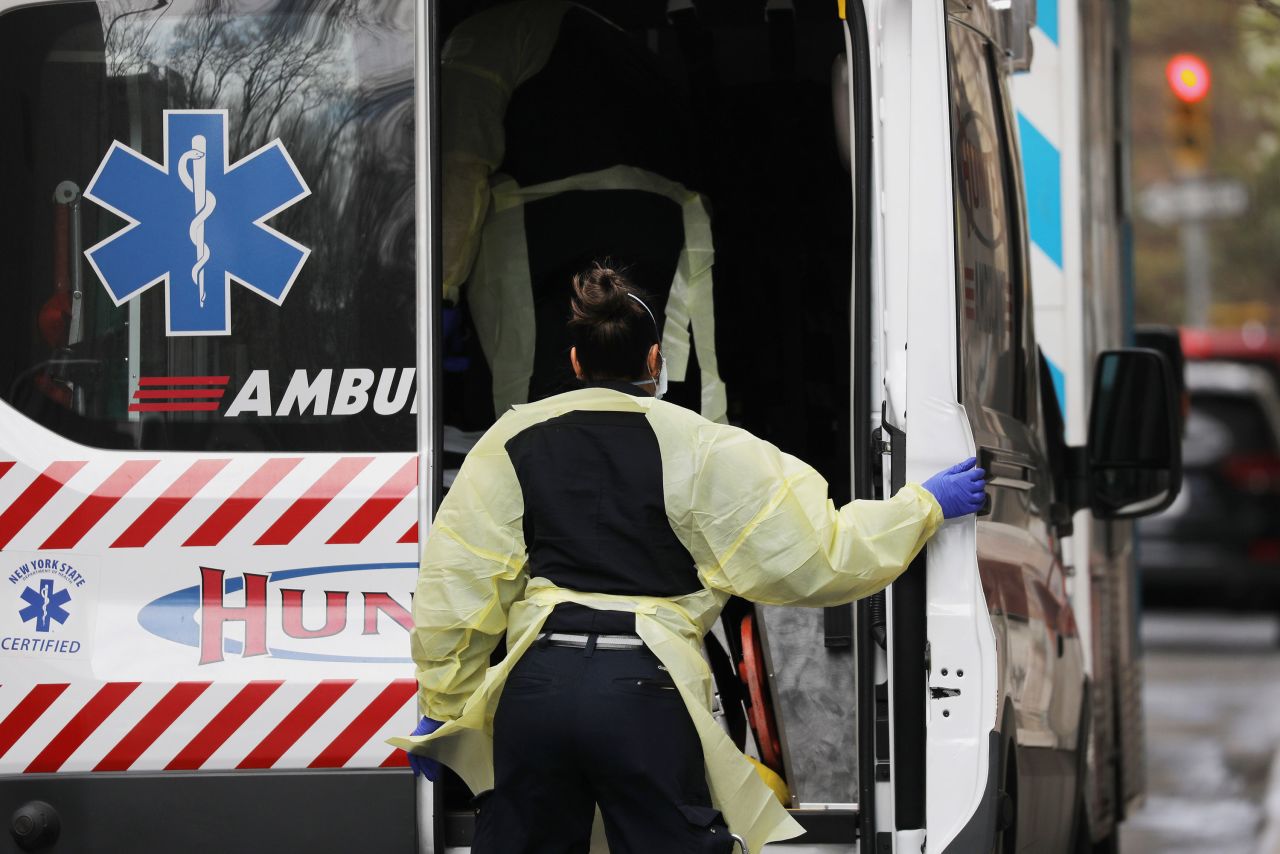 Health workers transport a patient to Mount Sinai Hospital in New York City on April 4.