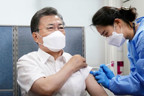 In this image provided by the South Korean Presidential Blue House, President Moon Jae-in receives a dose of the AstraZeneca Covid-19 vaccine in Seoul on March 23.