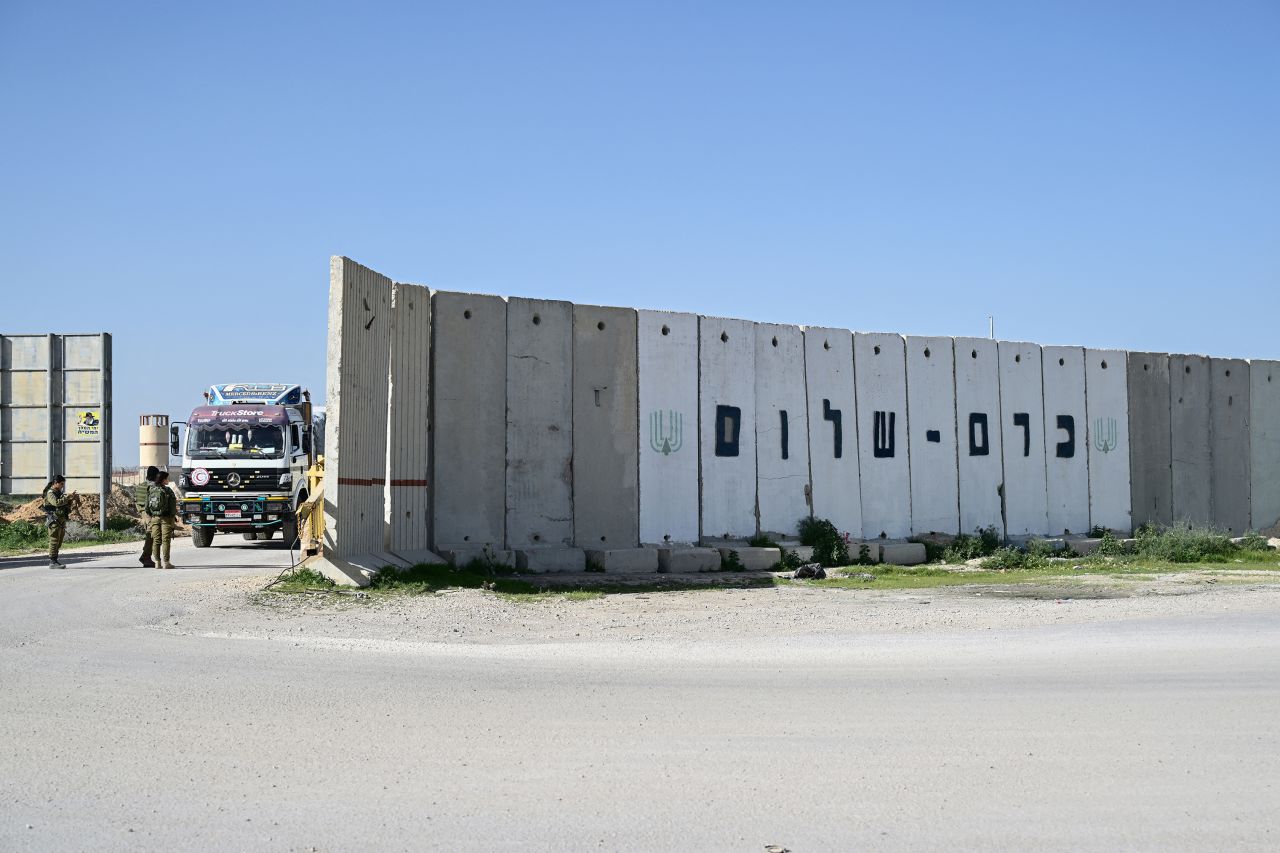 Trucks carrying humanitarian aid arrive from Egypt at the Israeli side of the Kerem Shalom border crossing with southern Gaza on December 22.