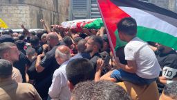 Mourners carry the body of 23-year-old Rashid Sedda in the West Bank town of Jit on Friday.