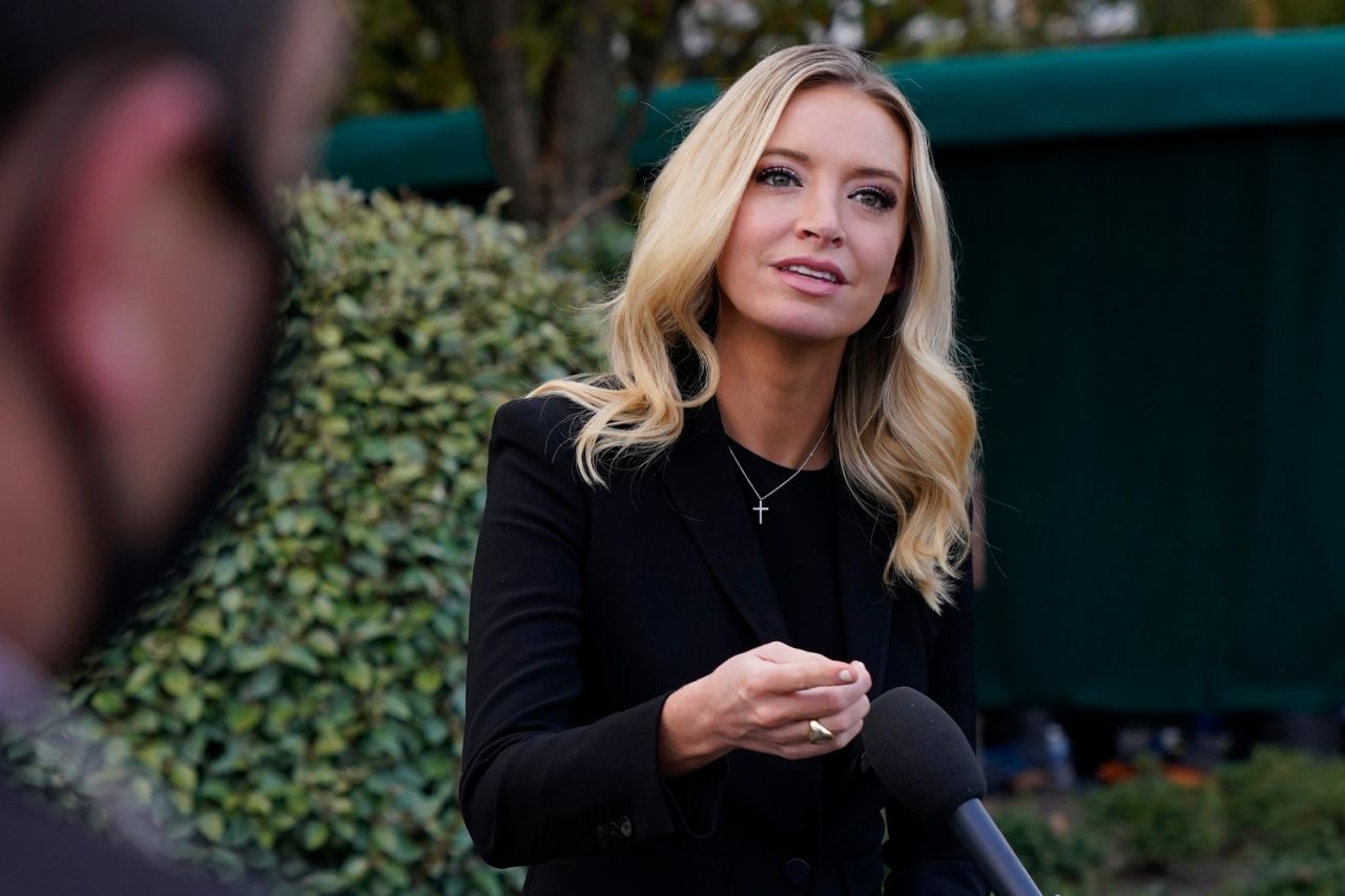 White House press secretary Kayleigh McEnany talks to the media on October 4 outside the White House in Washington, DC.