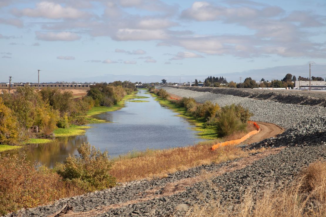 U.S. Army Corps of Engineers Sacramento District contractors install 7,500 feet of levee rock slope protection and a seepage berm along Prospect Slough, Sept. 26, 2023. The levee runs south of Interstate 80 in West Sacramento, California, a major commercial gateway.