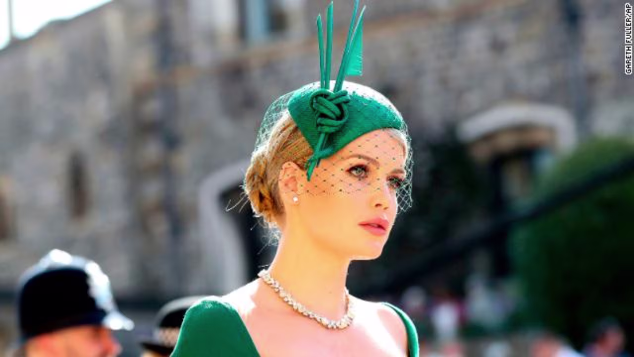 Lady Kitty Spencer opted for a refined teal green fascinator with a knotted sculptural feature.