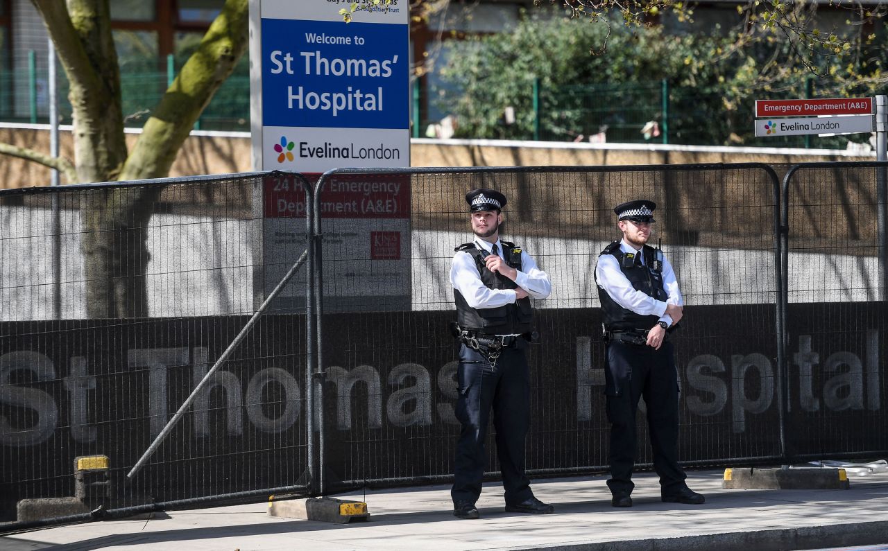 Police officers patrol outside St Thomas' Hospital  in London on April 7.
