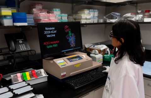 Dr. Nita Patel, Director of Antibody discovery and Vaccine development, looks at a computer model showing the protein structure of a potential Covid-19 vaccine at Novavax labs in Gaithersburg, Maryland, on March 20.
