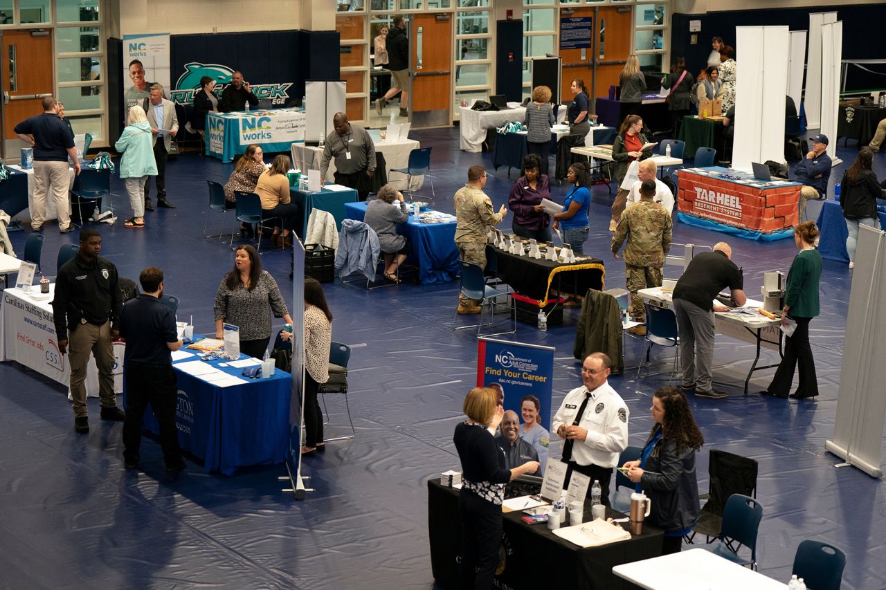 Jobseekers and representatives at a job fair at Brunswick Community College in Bolivia, North Carolina, on April 11.