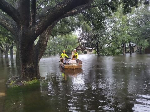 Orange County firefighters help people stranded by Hurricane Ian early Thursday in Orange County, Florida.