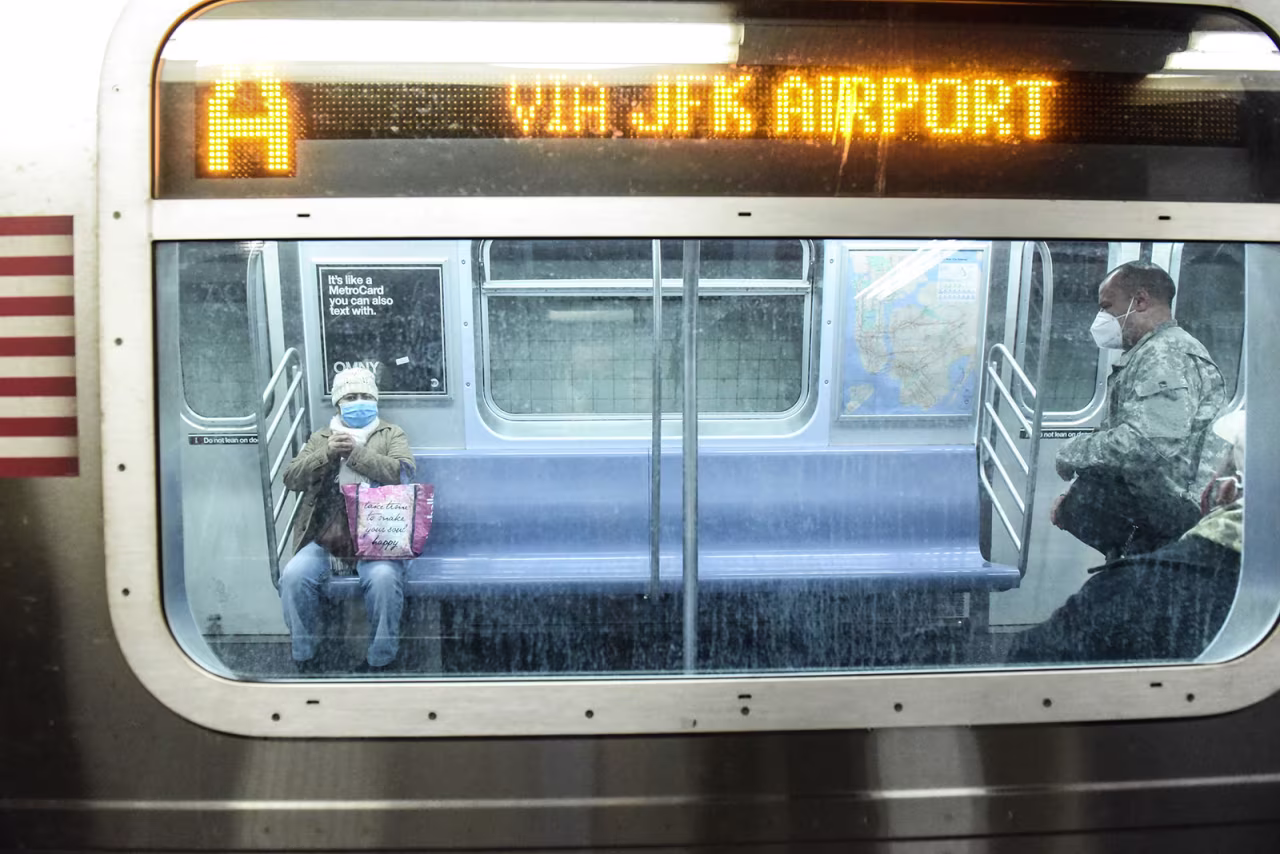 People ride the subway in New York City on May 6.