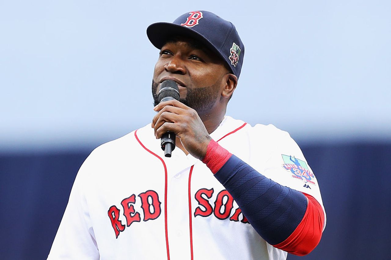 David Ortiz addresses the crowd during the pregame ceremony to honor his retirement before his last regular season home game at Fenway Park on October 2, 2016 in Boston.