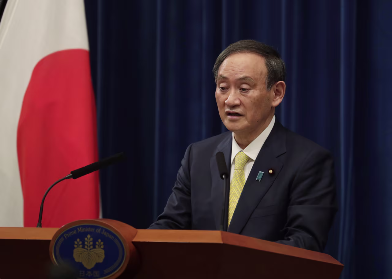 Yoshihide Suga, Japan's Prime Minister, speaks during a news conference in Tokyo on Friday, December 4. 