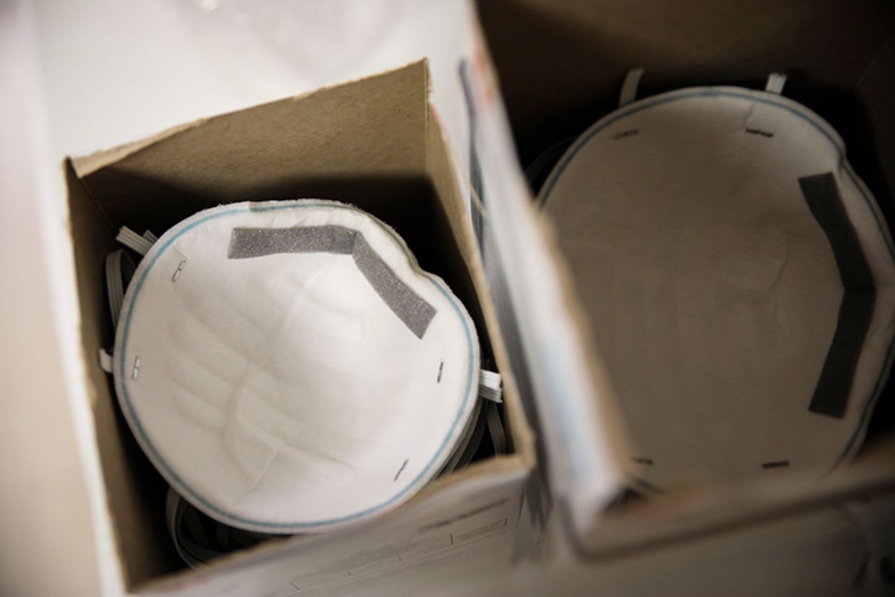 N95 masks rest on a cart of filled with protective gear that must be worn when dealing with patients with an infectious disease as Massachusetts General Hospital in Boston prepares for a possible surge in coronavirus patients on Thursday, February 27.