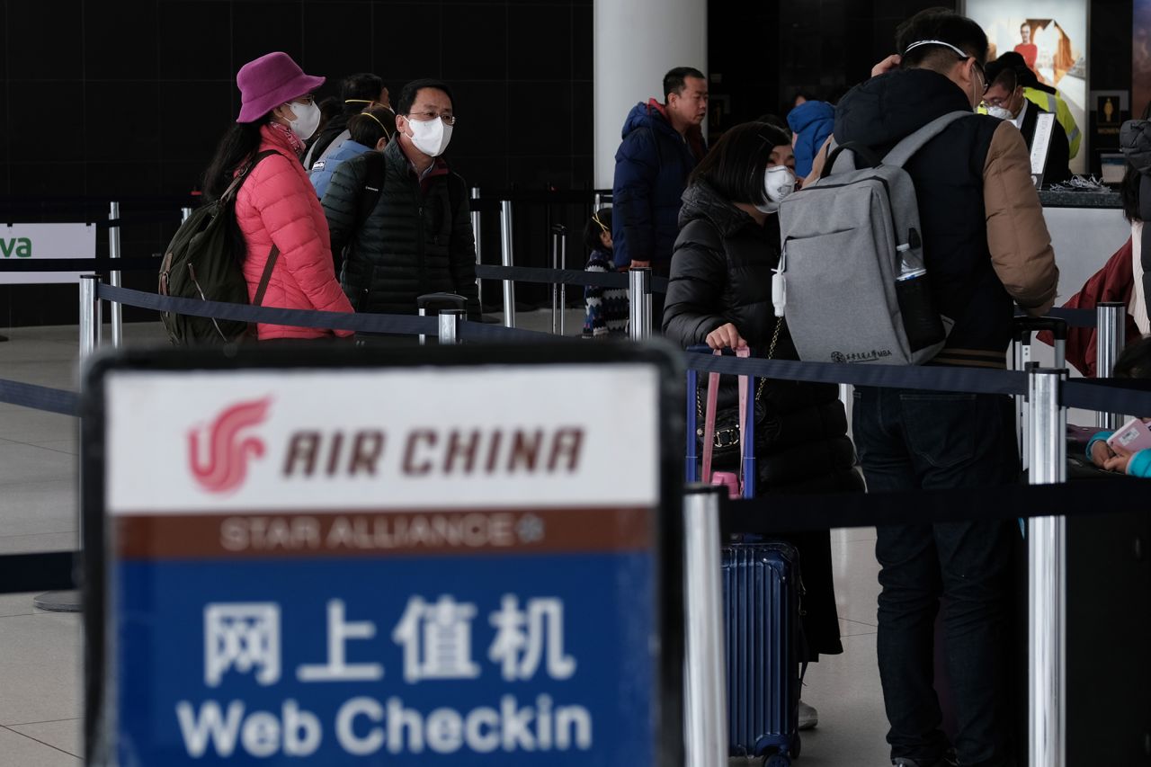 People wear masks at John F. Kennedy Airport (JFK) out of concern over the coronavirus on January 31, 2020 in New York City.