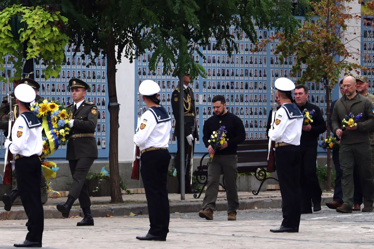 Ukrainian President Volodymyr Zelensky visits the “Wall of Remembrance of the Fallen Defenders of Ukraine” in Kyiv, Ukraine, on October 1. 