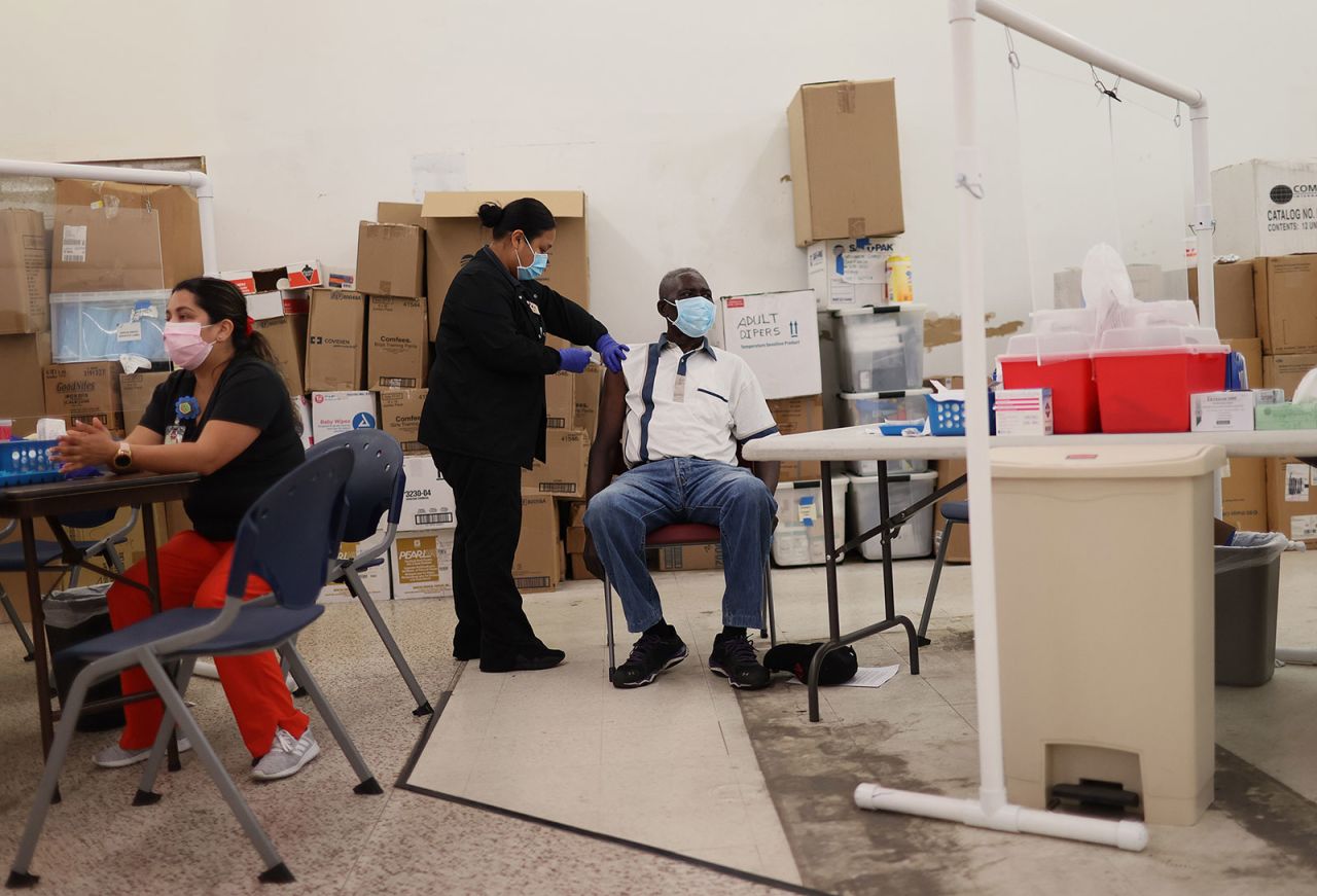 Louis Evariste receives a dose of the Moderna Covid-19 vaccine at a clinic in Immokalee, Florida, on May 20.