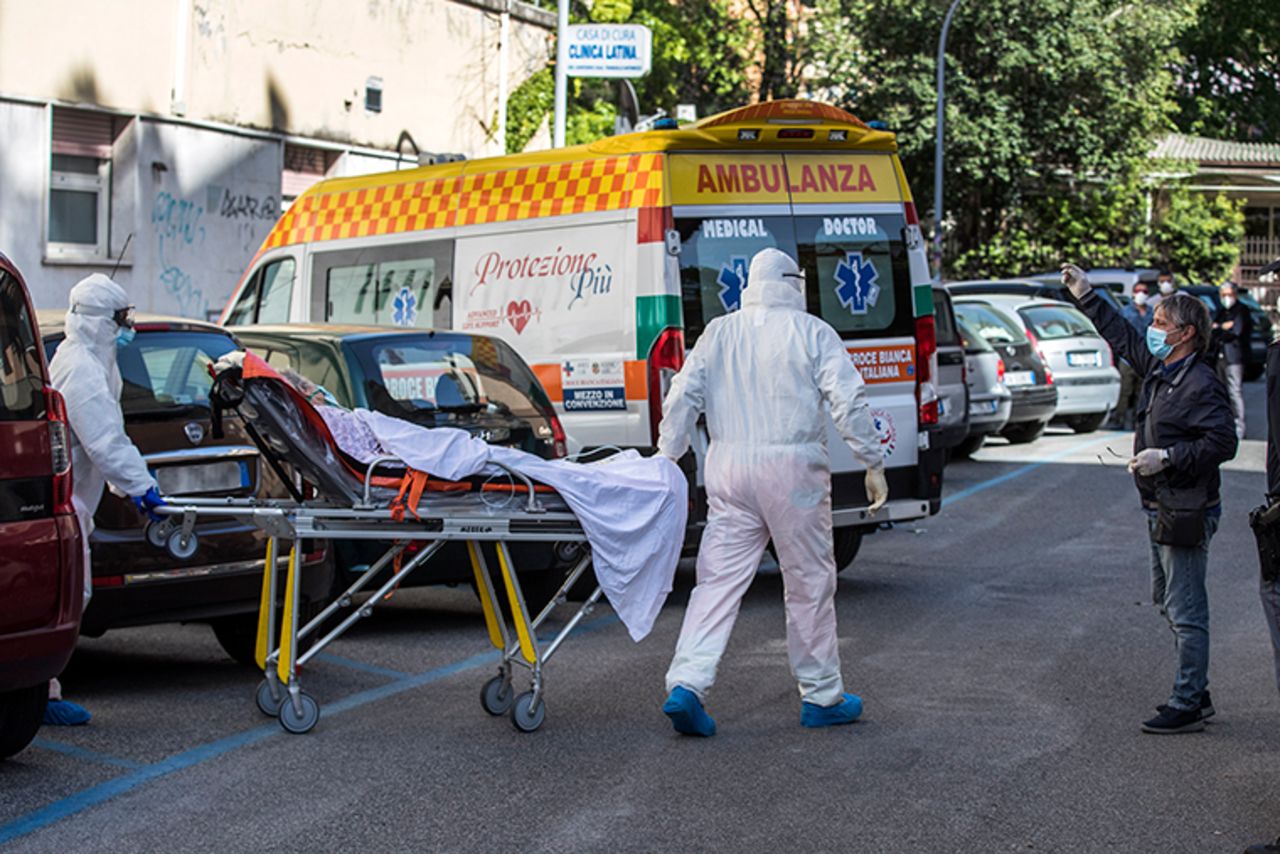 A patient who tested positive for COVID-19 is being transported to the Spallanzani hospital, after various cases of the coronavirus outbreak were discovered in a nursing home in Rome on Saturday, May 2.