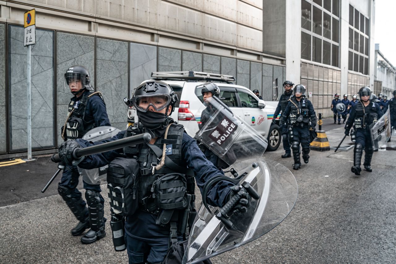 Hong Kong police clashed with pro-democracy protesters outside government headquarters on Monday.