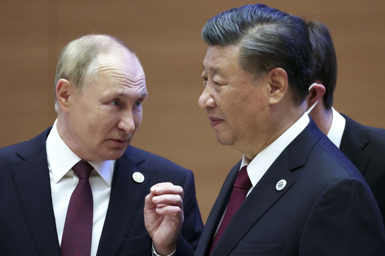 Russian President Vladimir Putin, left, gestures while speaking to Chinese President Xi Jinping during the Shanghai Cooperation Organization (SCO) summit in Samarkand, Uzbekistan on Friday, Sept. 16. 