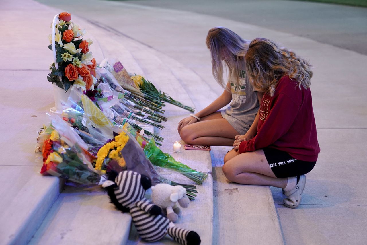 People attend a vigil at Jug Tavern Park, following the shooting at Apalachee High School in Winder, Georgia, on September 4.