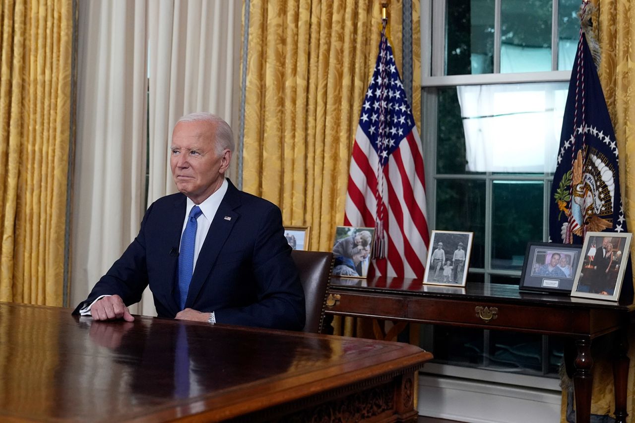 President Joe Biden pauses as he concludes his address to the nation, about his decision to drop his Democratic presidential reelection bid, from the Oval Office of the White House in Washington, DC on July 24