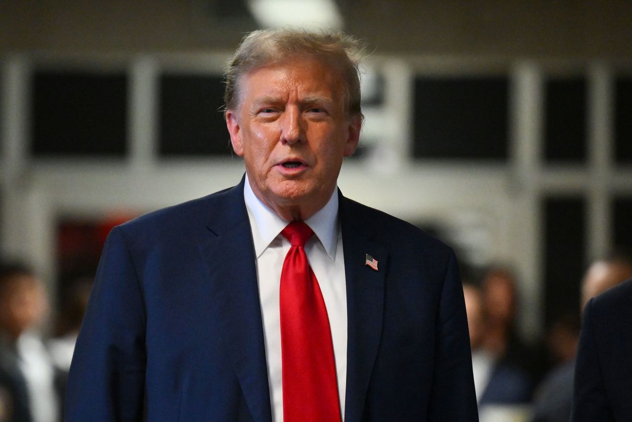 Former President Donald Trump speaks to the press after the first day of jury selection for the criminal case against him.