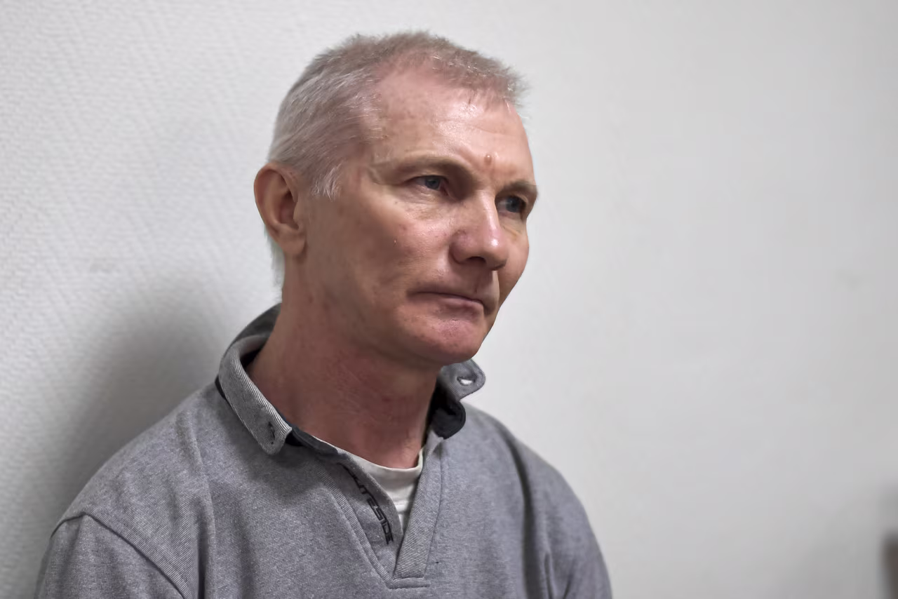 Alexey Moskalyov sits in a courtroom in Yefremov, Tula region, Russia, on March 27.