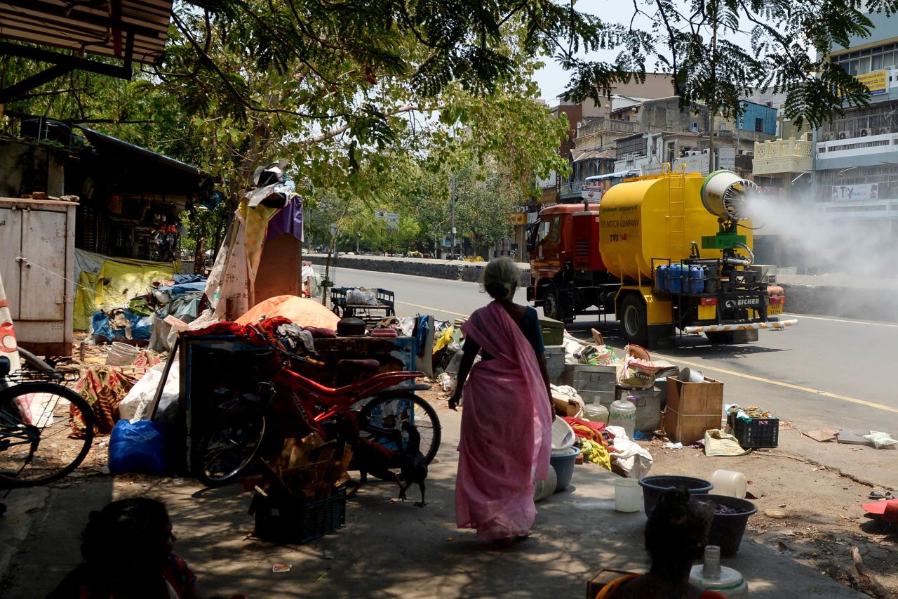 Municipal workers spray disinfectant on a street during a government-imposed nationwide lockdown in Chennai, India on May 1. 