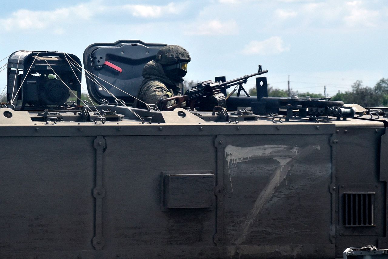 Russian military on a roadside in the Kherson region in May.