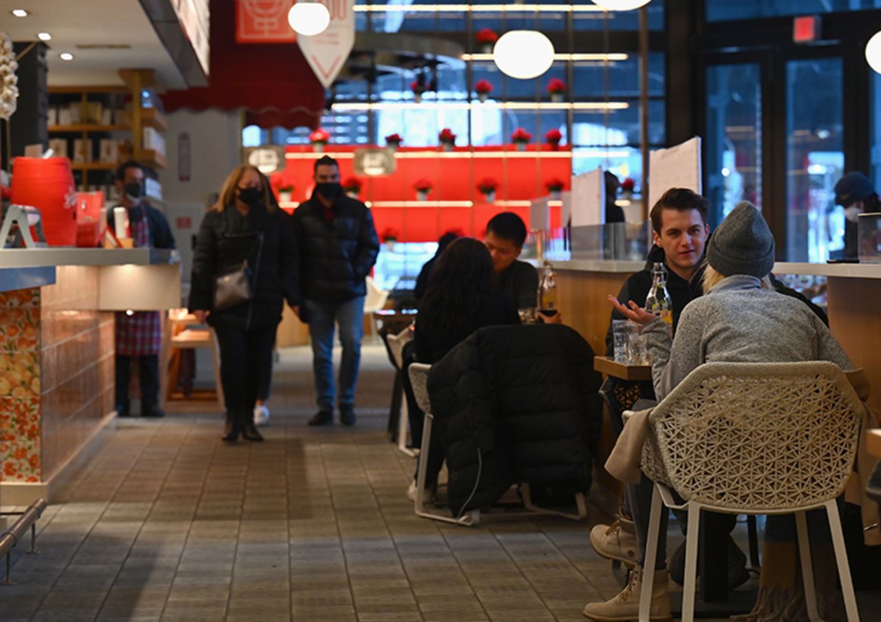 People dine at a restaurant at Hudson Yards on February 12, 2021 in New York City as restaurants were to reopen for indoor dining at 25 percent capacity.