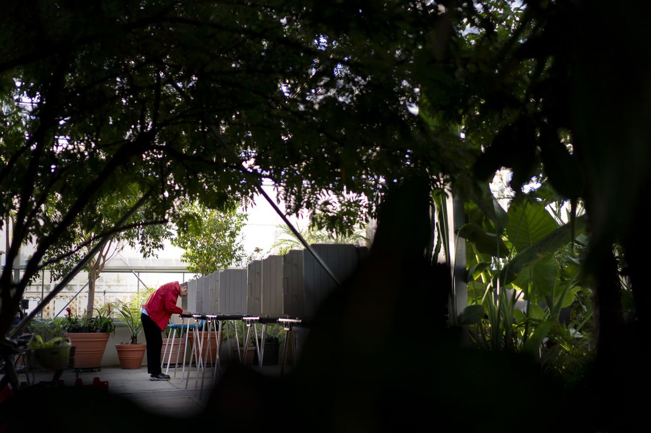 A voter marks a ballot for the midterm election at a polling site at the Roger Williams Park Botanical Center in Providence, Rhode Island on Tuesday.