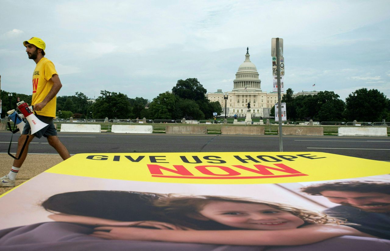 Protesters and family members of Israelis being held hostage by Hamas hold a rally on the National Mall in Washington, DC, on Tuesday.