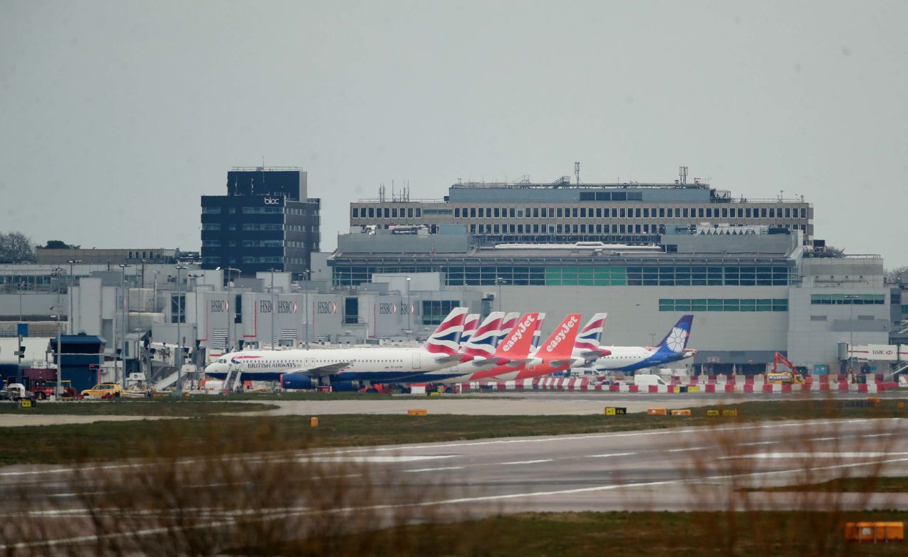 British Airways and easyJet planes are seen parked at Gatwick Airport in Crawley, England, on March 29.