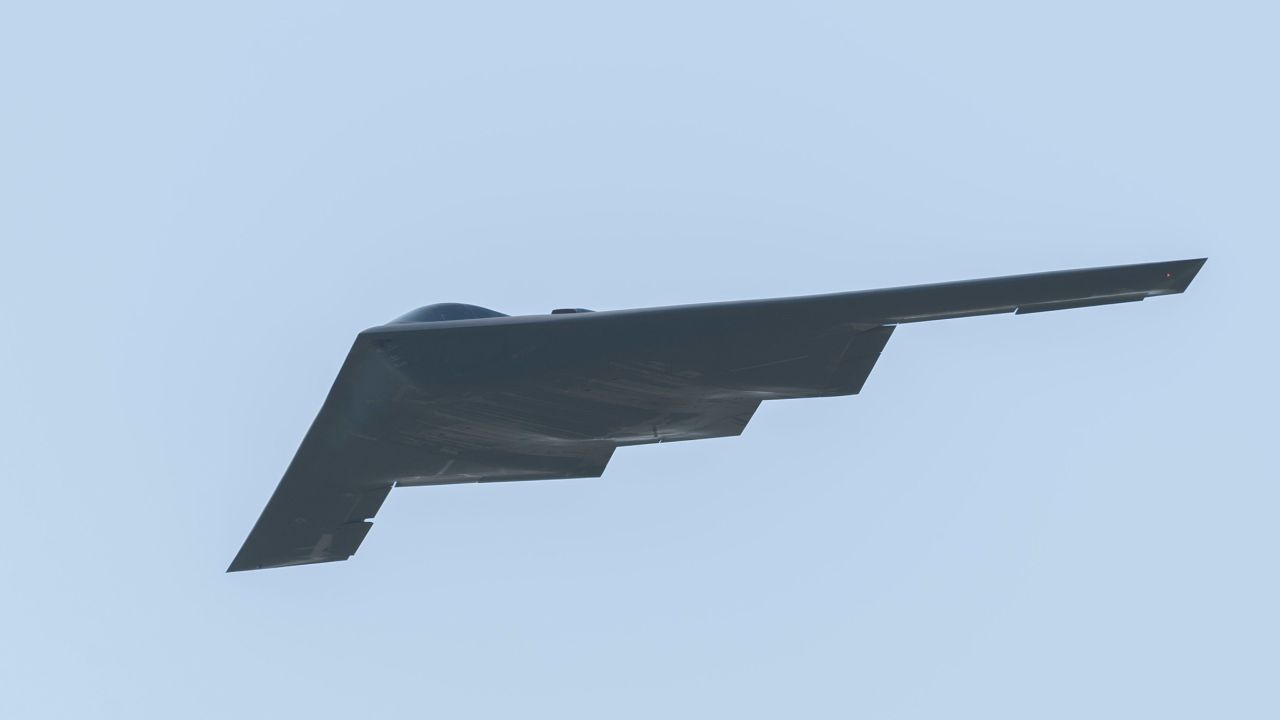 A U.S. Air Force B-2 Spirit stealth bomber assigned to the 509th Bomb Wing flys over Whiteman Air Force Base, Mo., July 10, 2024. The B-2 was preparing to practice a flyover with two T-38 Talon aircraft in preparation for the 2024 Wings Over Whiteman Air Show. Wings Over Whiteman is a bi-annual air show hosted by Whiteman AFB.