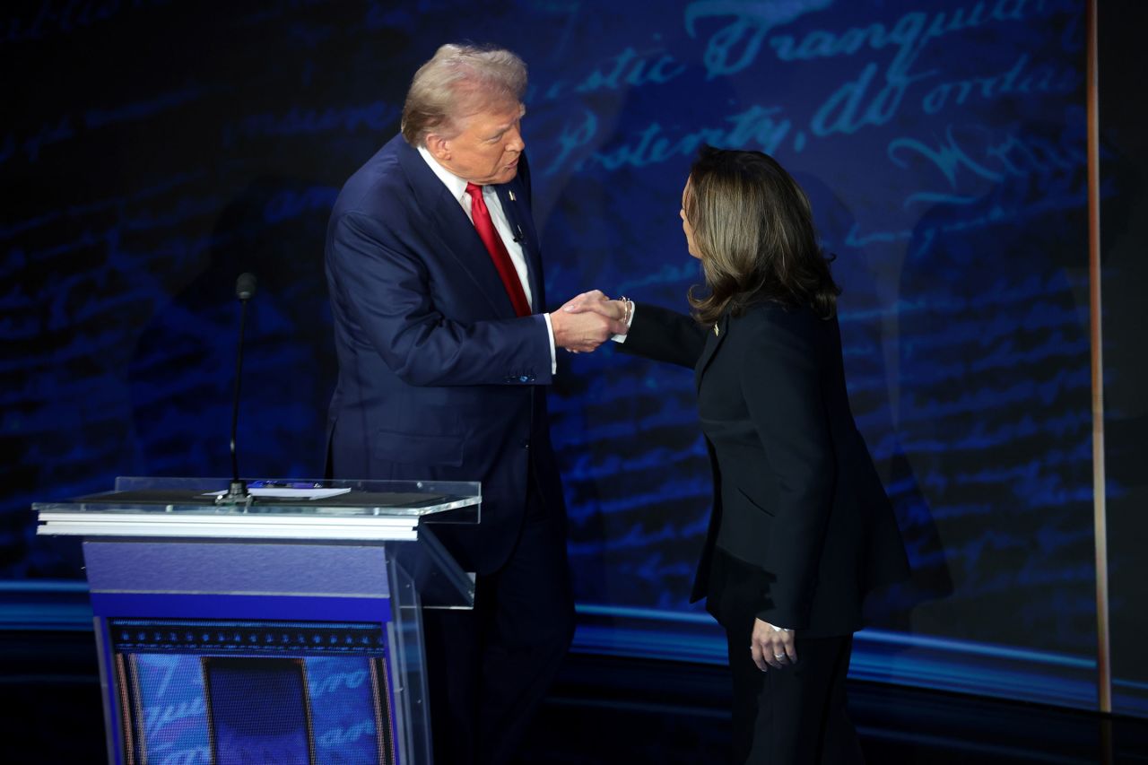 Former President Donald Trump and Vice President Kamala Harris greet as they debate for the first time during the presidential election campaign at The National Constitution Center on September 10 in Philadelphia. 