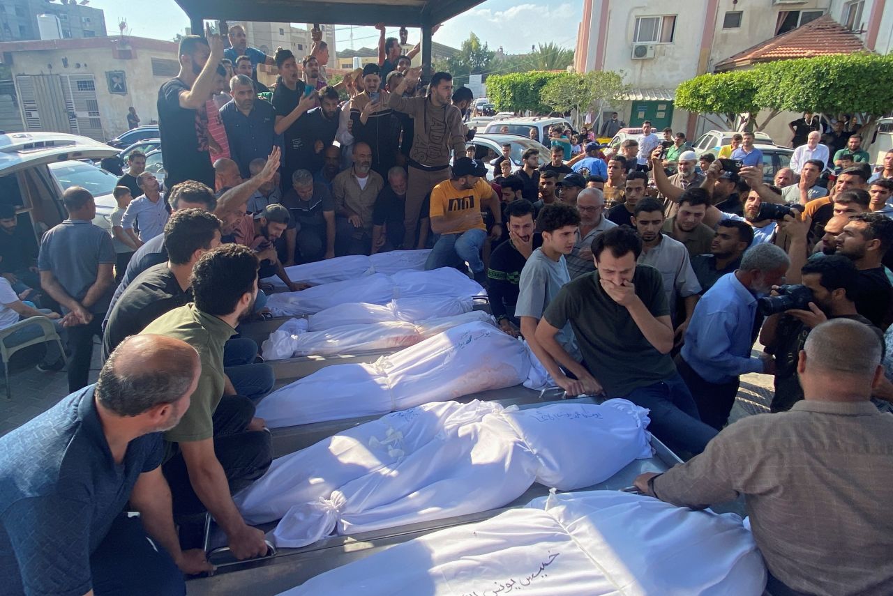 Mourners attend the funeral of Palestinians from al-Agha family, who were killed in Israeli strikes, in Khan Younis, southern?Gaza, on October 14, 2023.