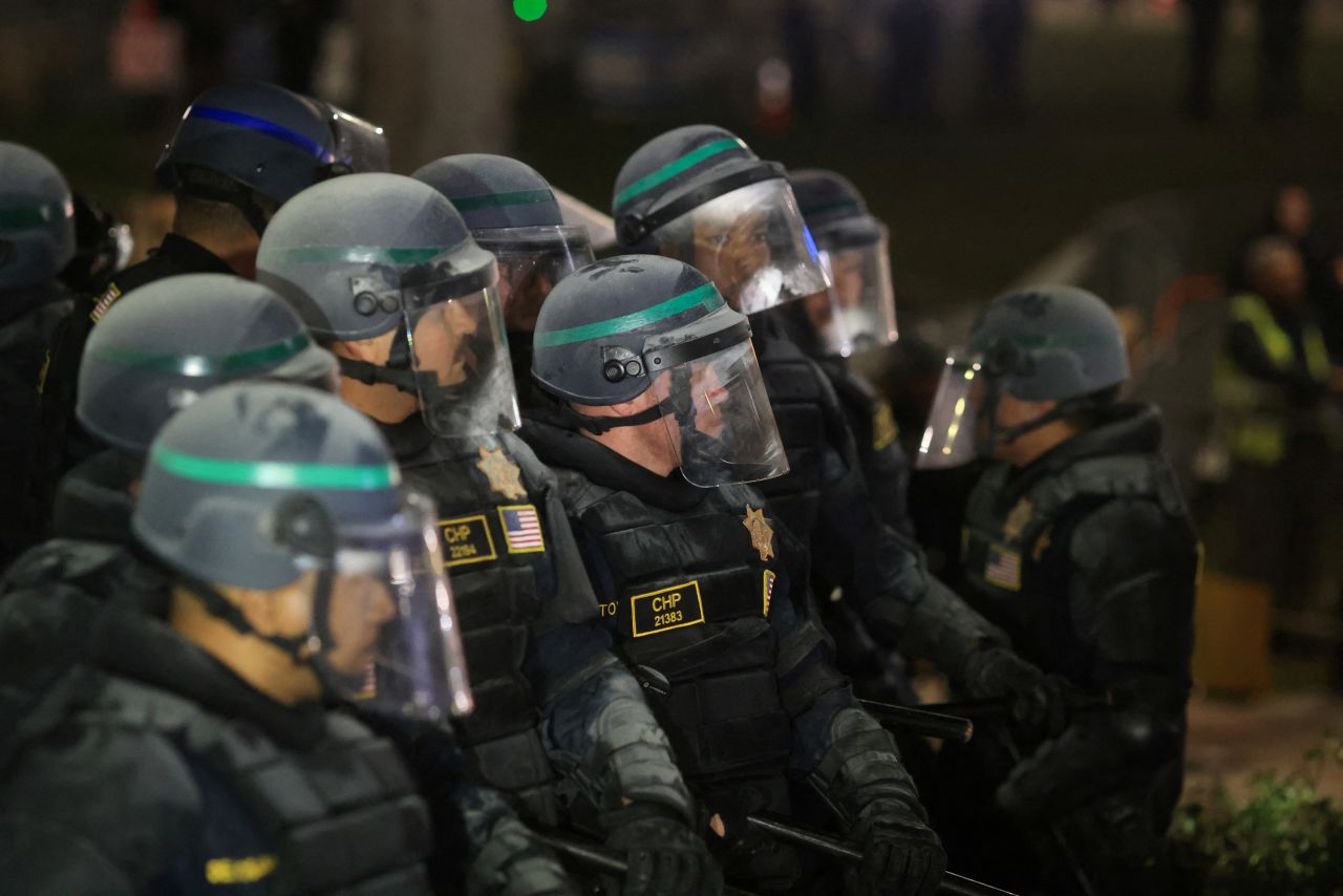 Law enforcement officers stand guard during a protest at UCLA on May 2. 