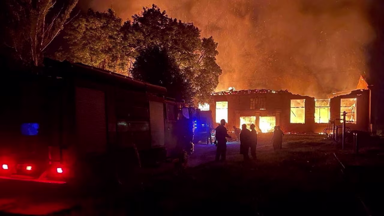 Smoke and flames rise after President Volodymyr Zelensky says a Russian-guided aerial bomb hit a blood transfusion center in the town of Kupyansk in northeastern Ukraine, in this image released on August 5, 2023, and obtained from the Ukrainian President's Telegram account.