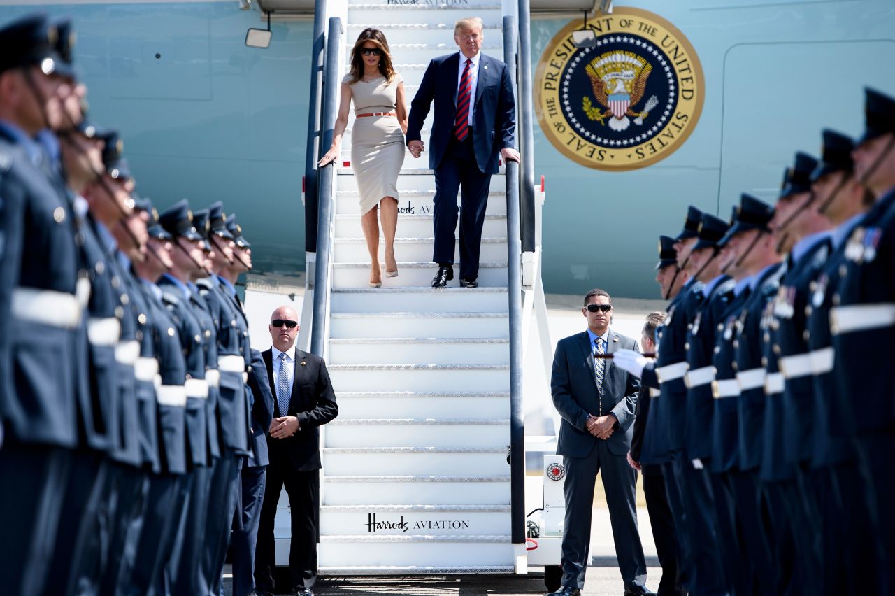 Trump and the first lady disembark Air Force One at Stansted Airport, north of London, on Thursday.