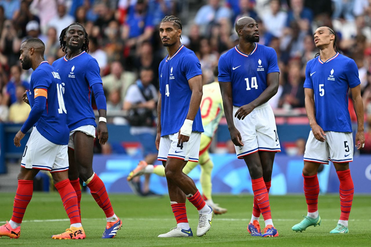 French players reacts to Spain’s third goal in the men’s gold medal soccer match on Friday, August 9. 